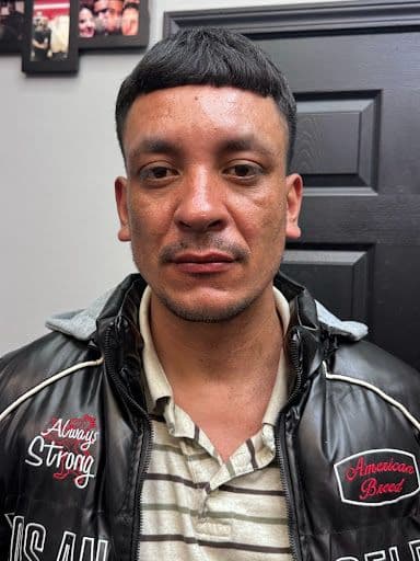 Carlos - barber at The Dominicans Barbershop