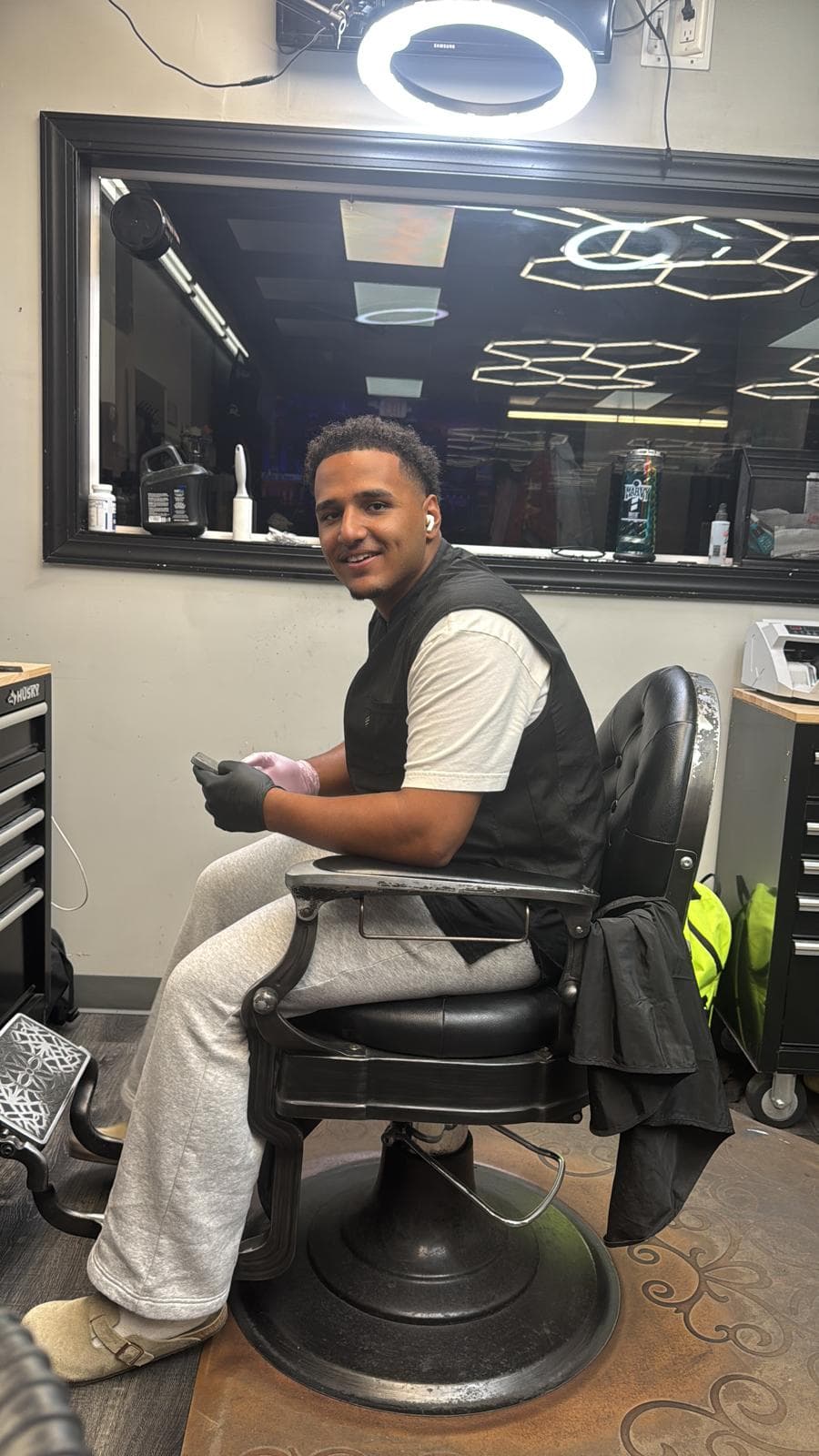 Henny - barber at The Dominicans Barbershop