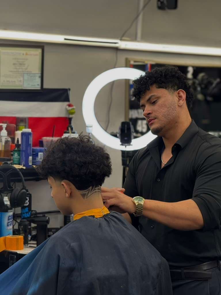 Manopla - barber at The Dominicans Barbershop